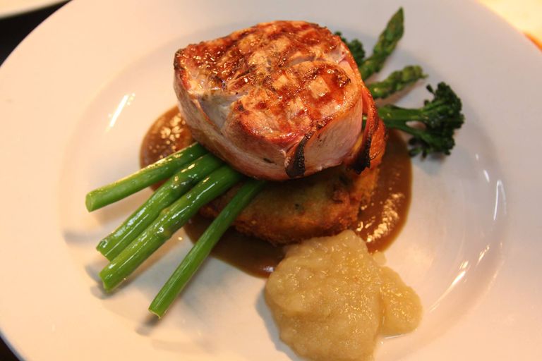 Pork medallion with greens and apple sauce
